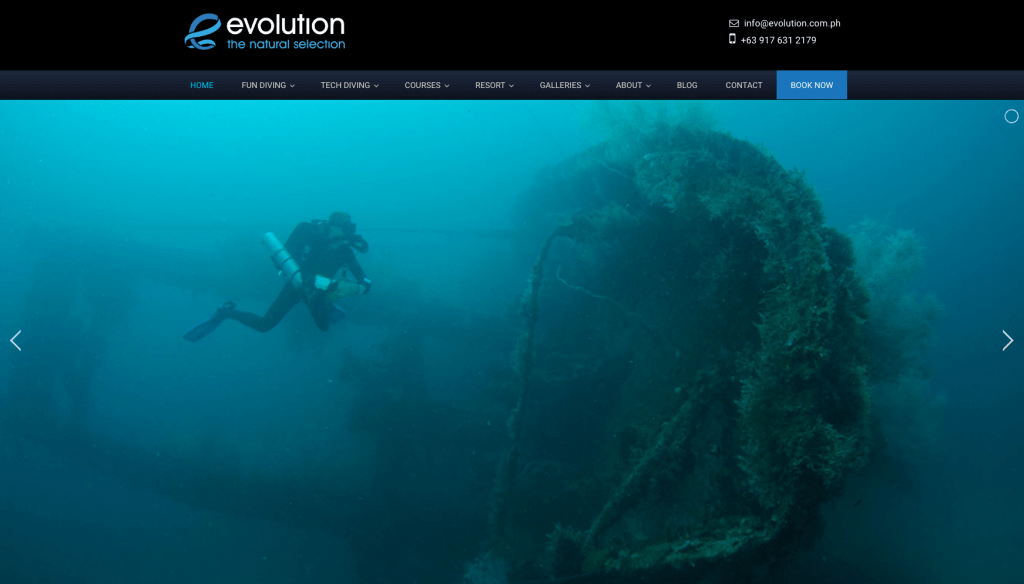 Image of a diver exploring a ship wreck