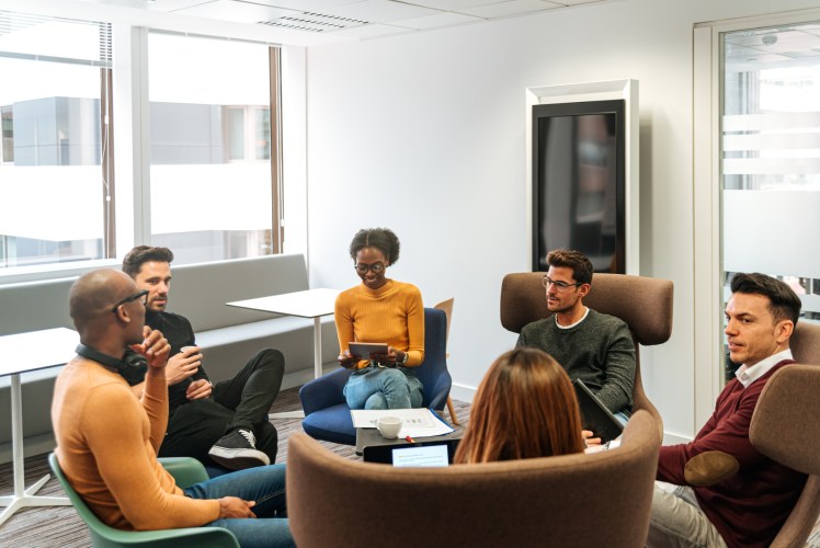 team meeting around a table