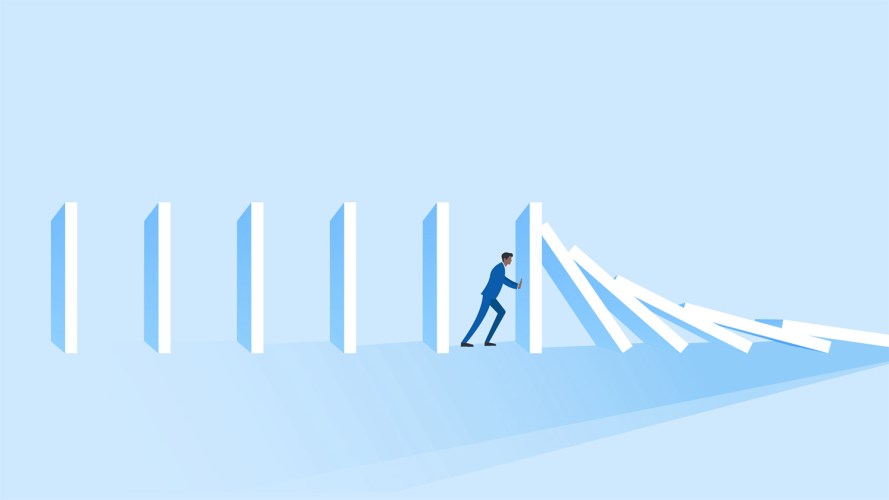 illustration of a person in a suit holding up a falling wall
