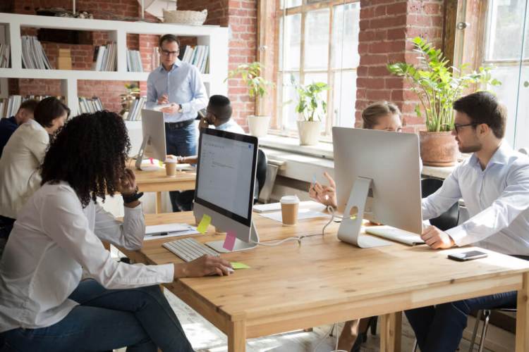 coworkers around a conference table