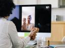 doctor helping woman via computer for telehealth virtual healthcare experience