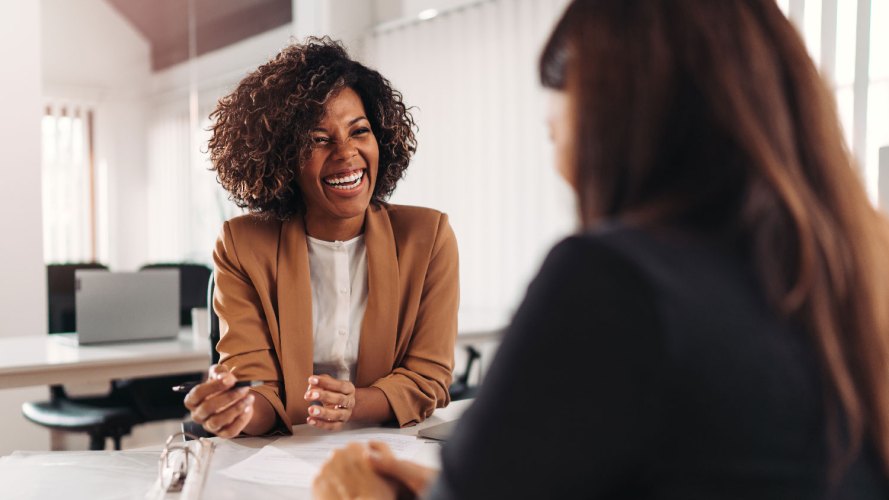 woman advising another woman insurance industry autonomous finance