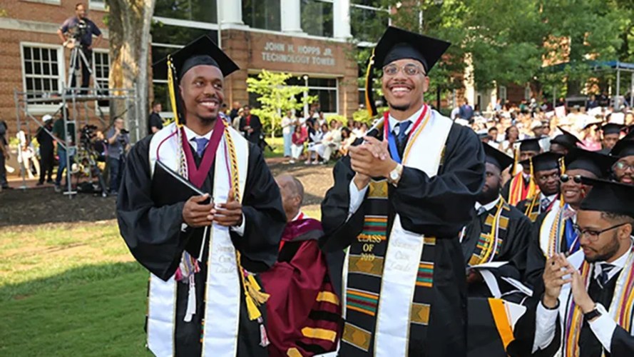 College graduates smiling