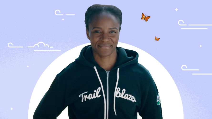 Photo of Trailblazer Amanda Ouedrago in a black Trailblazer hoodie against a purple background