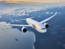 An image of a FedEx plane in flight. Retail logistics.