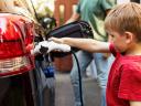 child using an electric vehicle charger: Utility customer experience