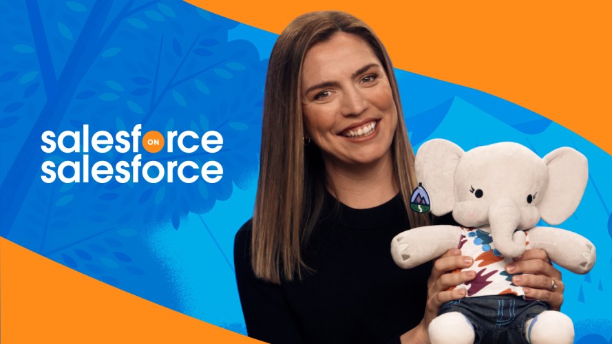 Event marketing expert and Salesforce Vice President Erin Oles holding a stuffed elephant toy.