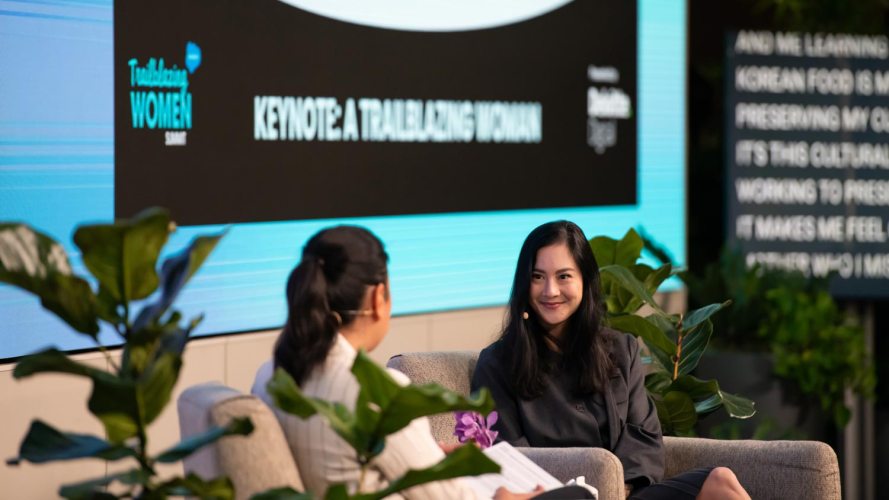 Two women on stage at the Trailblazing Women summit: gender equality summit