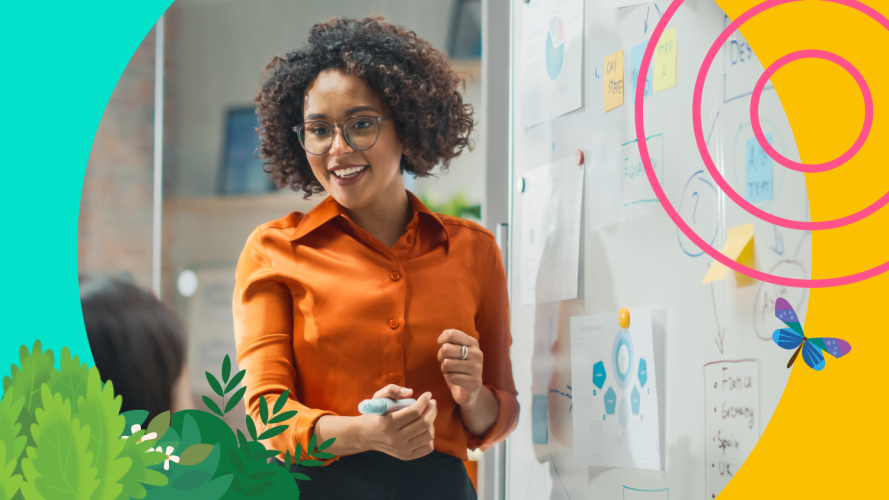 A photo of a sales leader at a whiteboard: sales forecasting techniques