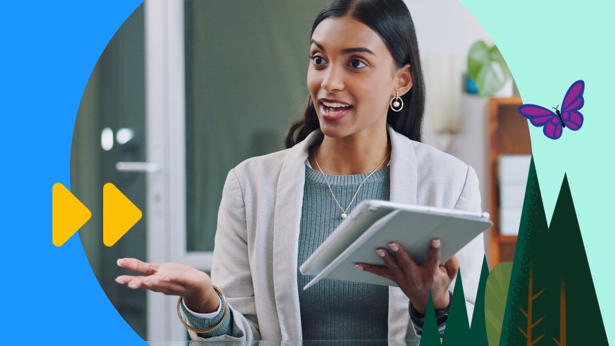 Sales pitch: a woman holding a tablet while talking