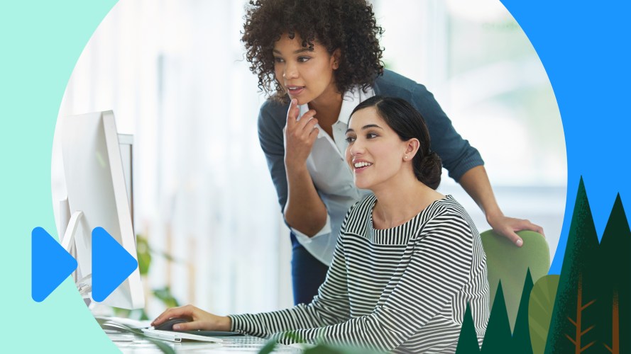 Sales engineer: two sales team members looking at a computer.