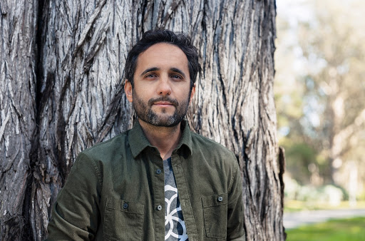 Diego Saez-Gil, Founder of Pachama, poses against a tree