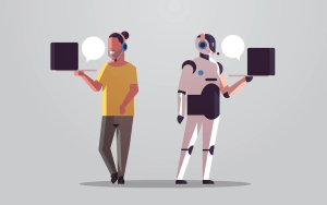a human and a robot with laptops in their hands